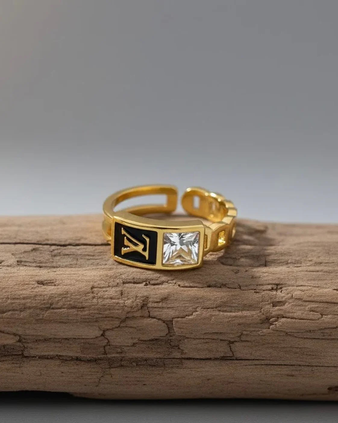 Baroque Royal Crest Emerald Cut Ring